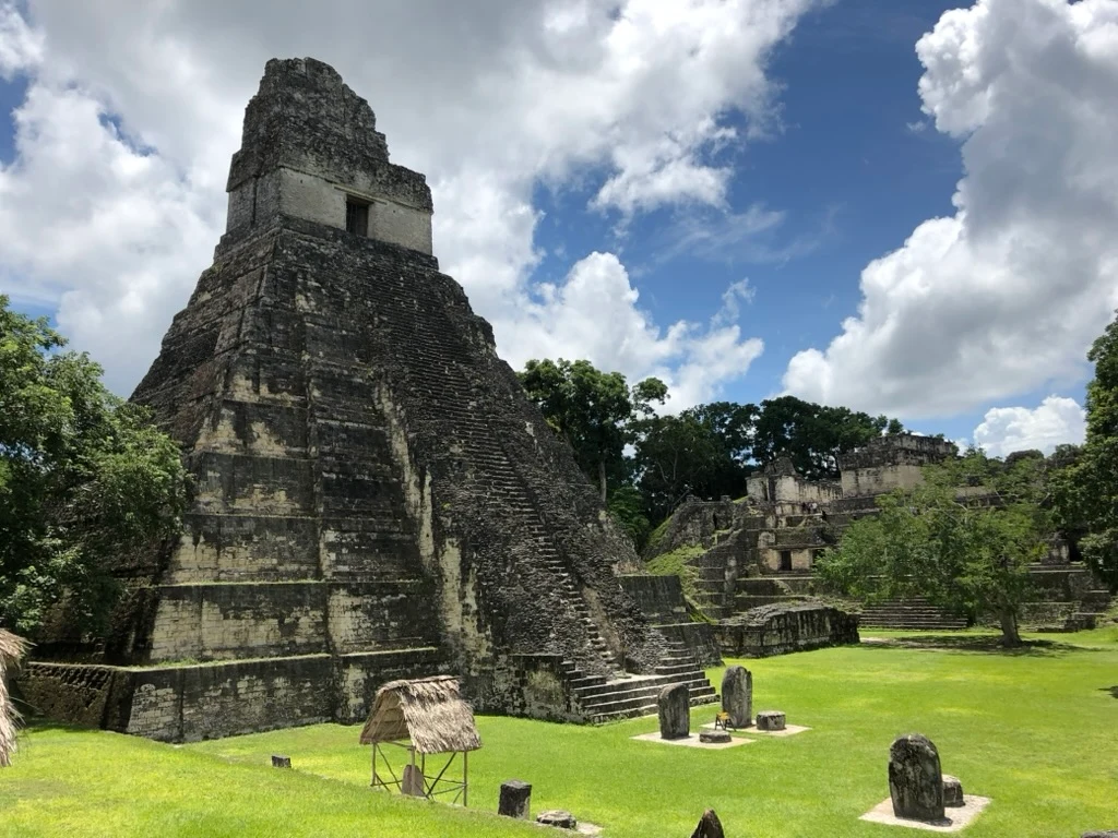 A Maya temple beneath a blue sky
