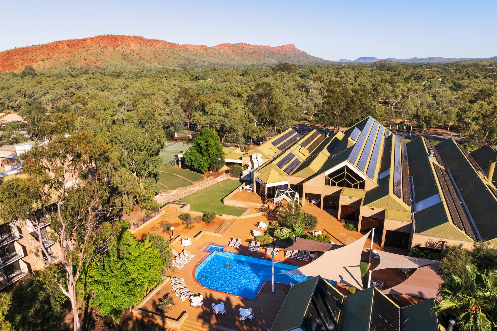 A green oasis beneath the MacDonnell Ranges.